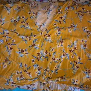 yellow floral crop top and white long sleeve shirt